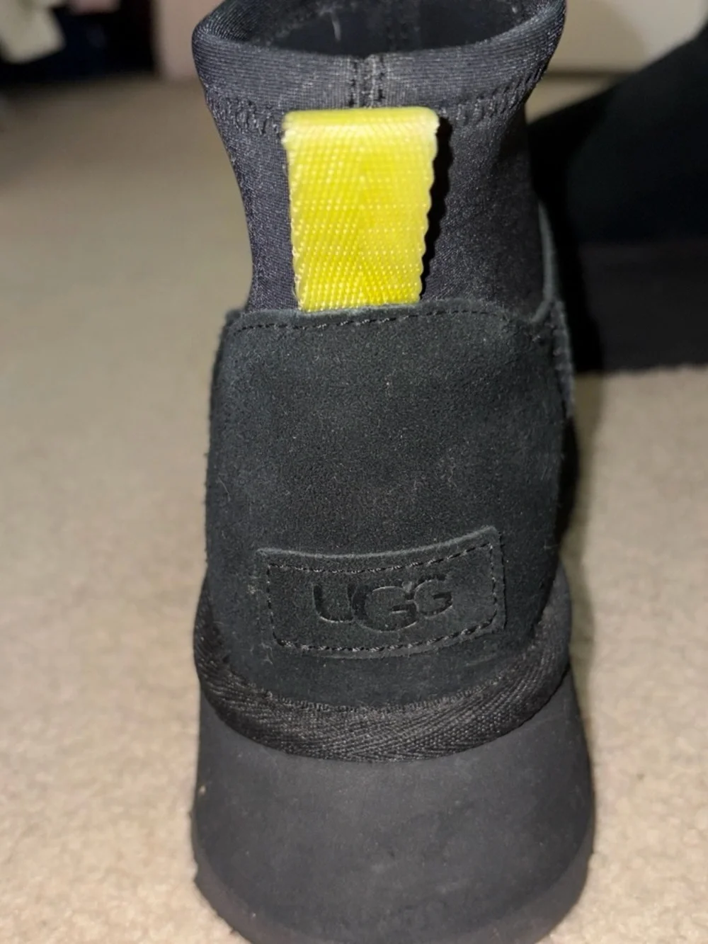UGG Black Platform Ankle Boots with Yellow Pull Tab